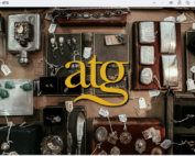 Antiques flat-lay with ATG company logo